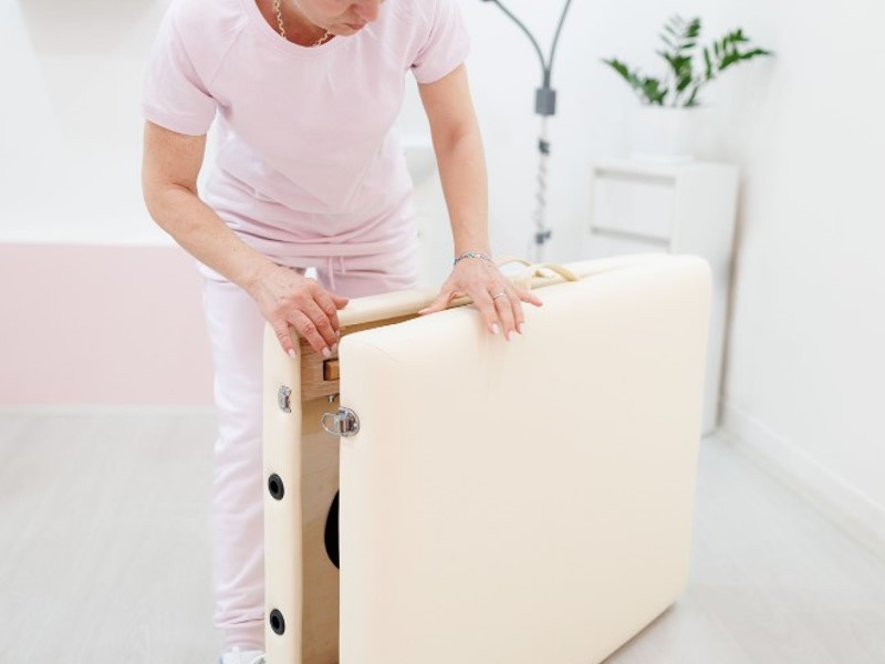 portable massage table made of aluminum or wood